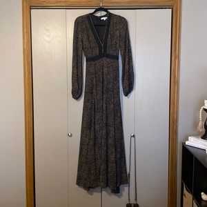 Baltic Born Dress zipper in back and tie waist. Dress is lined.